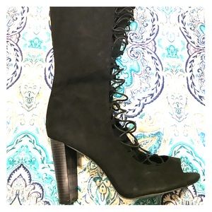 Black lace up boot.